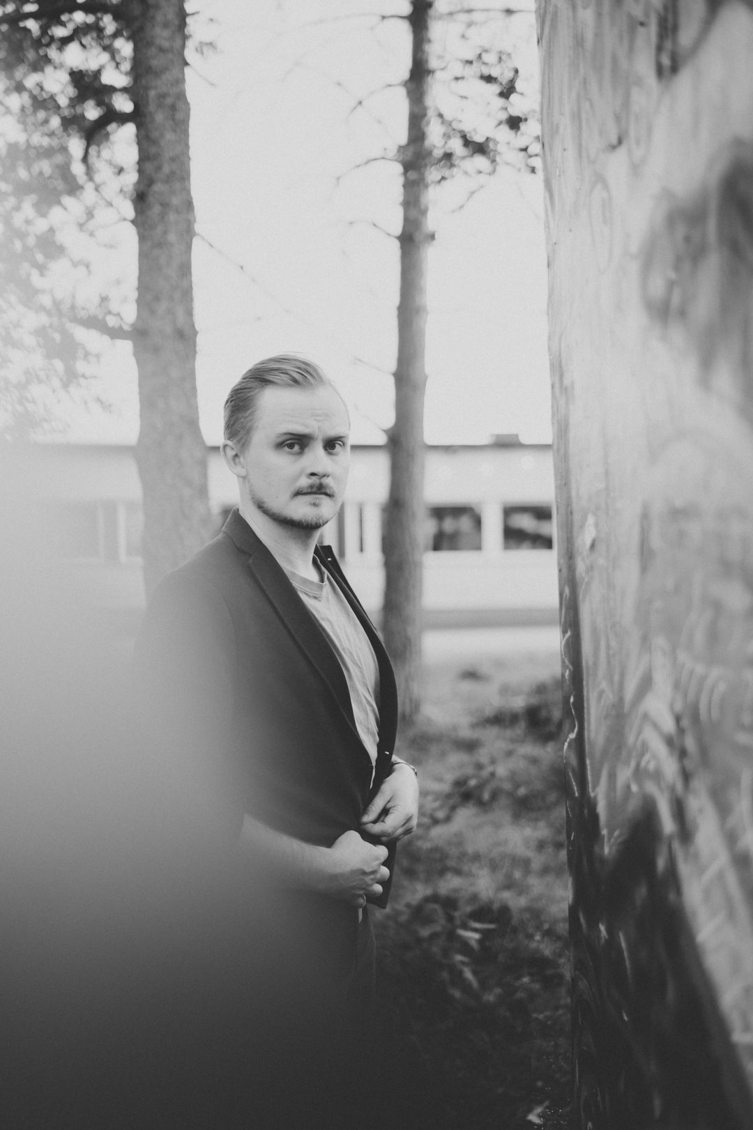 Markus Hav, black and white outdoor portrait among trees